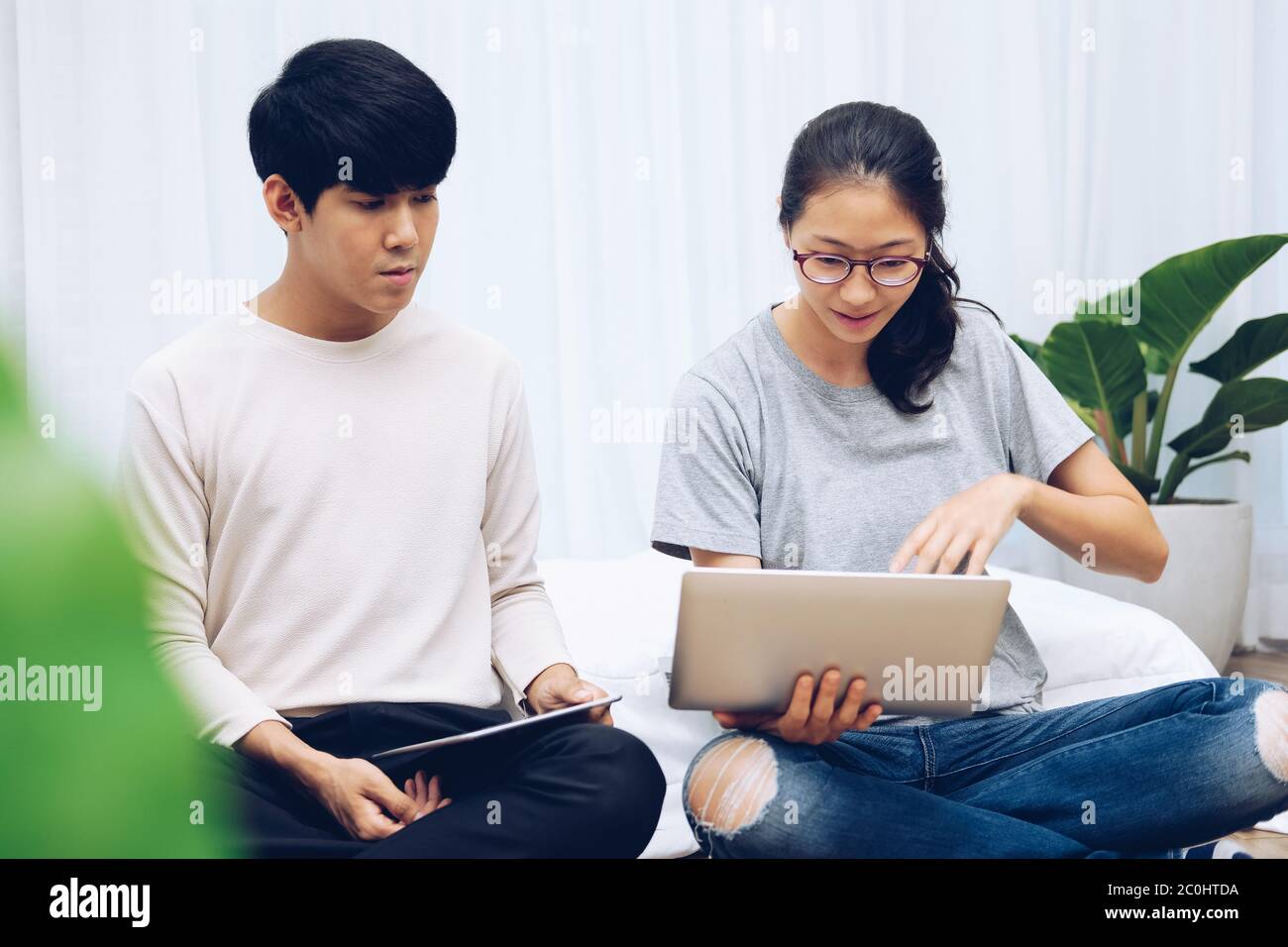 man woman friends using computer tablet. startup teamwork team working ...