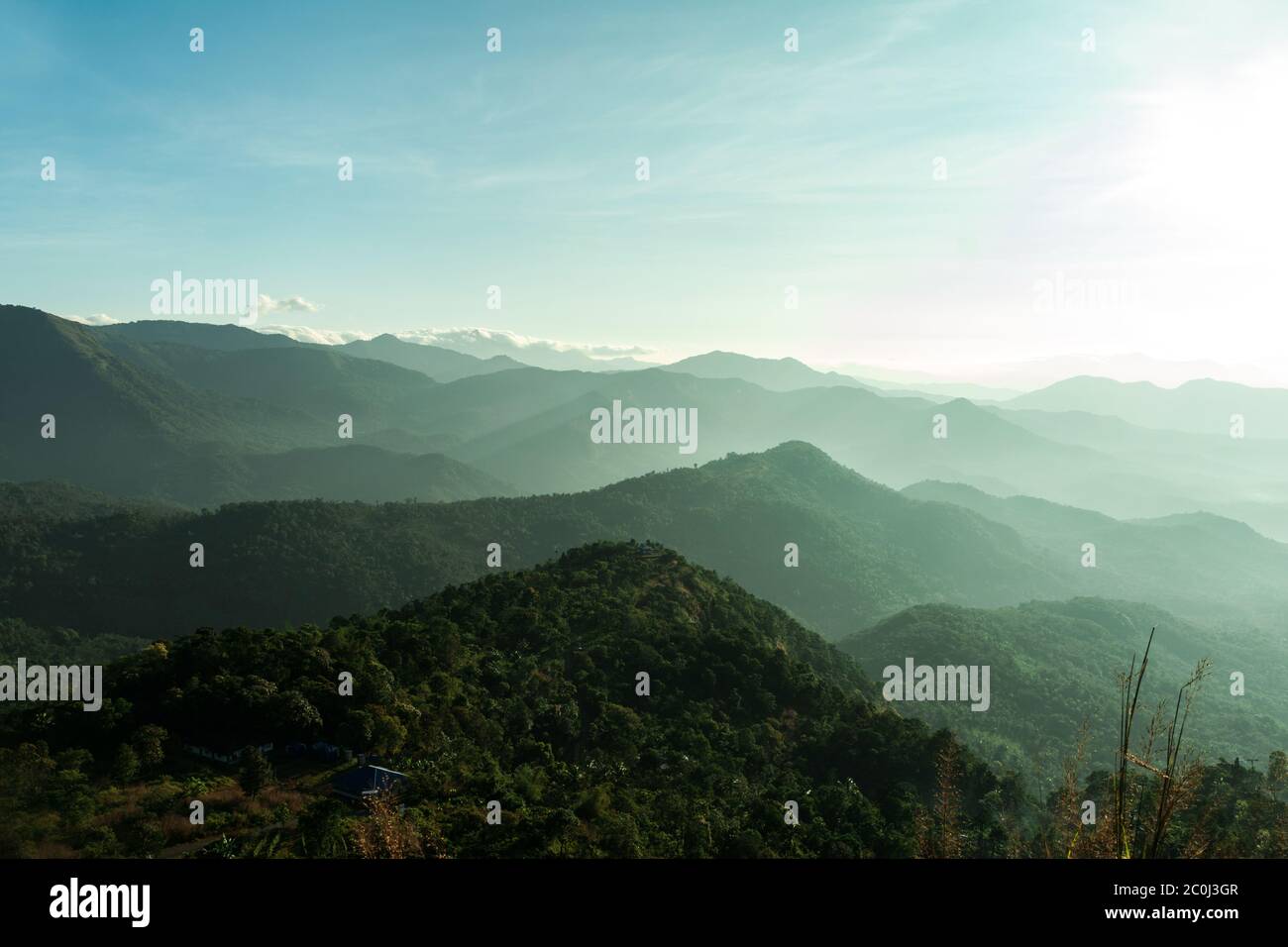 Beautiful Mountain valley with morning sunlight Kerala nature landscape image, famous Tourist spot in Kannur Kerala, Stock Photo