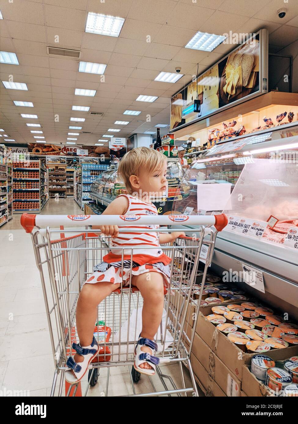 Budva, Montenegro - 17 march 2021: A child with a small trolley in the  supermarket, go shopping with his mother. The family goes shopping Stock  Photo - Alamy