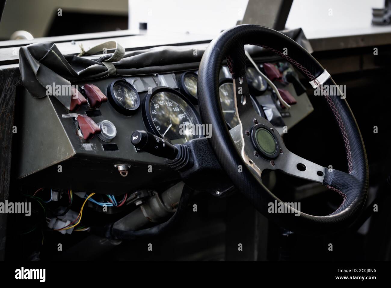 Military vehicle. Army Jeep Interior detail.  Interior Design, Steering Wheel and Dashboard Stock Photo