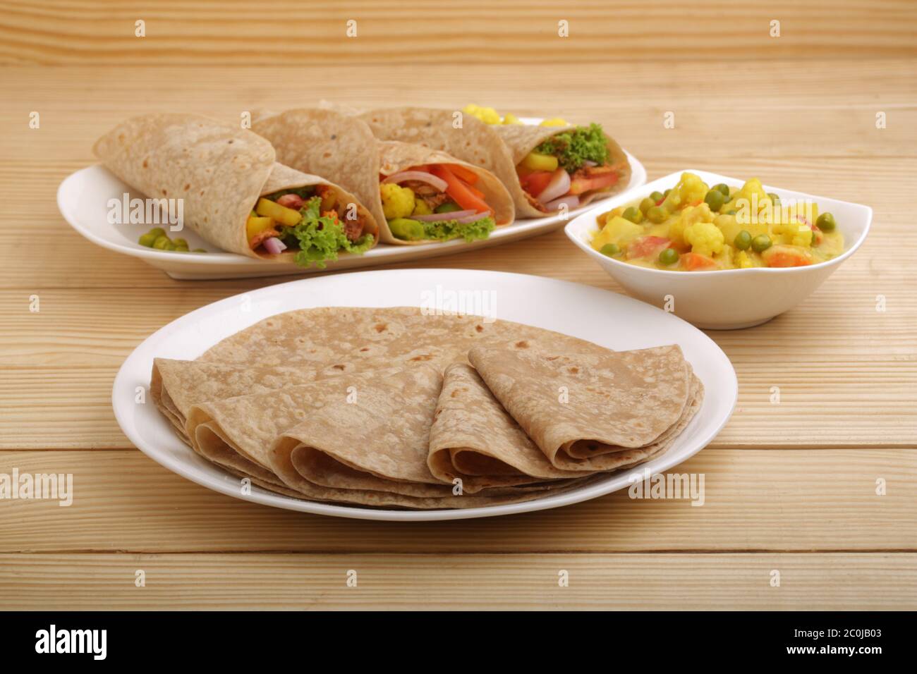 Indian flat bread or Chapati or Roti,which is a traditional  and popular Indian breakfast and lunch item made of wheat flour with potato curry as side Stock Photo