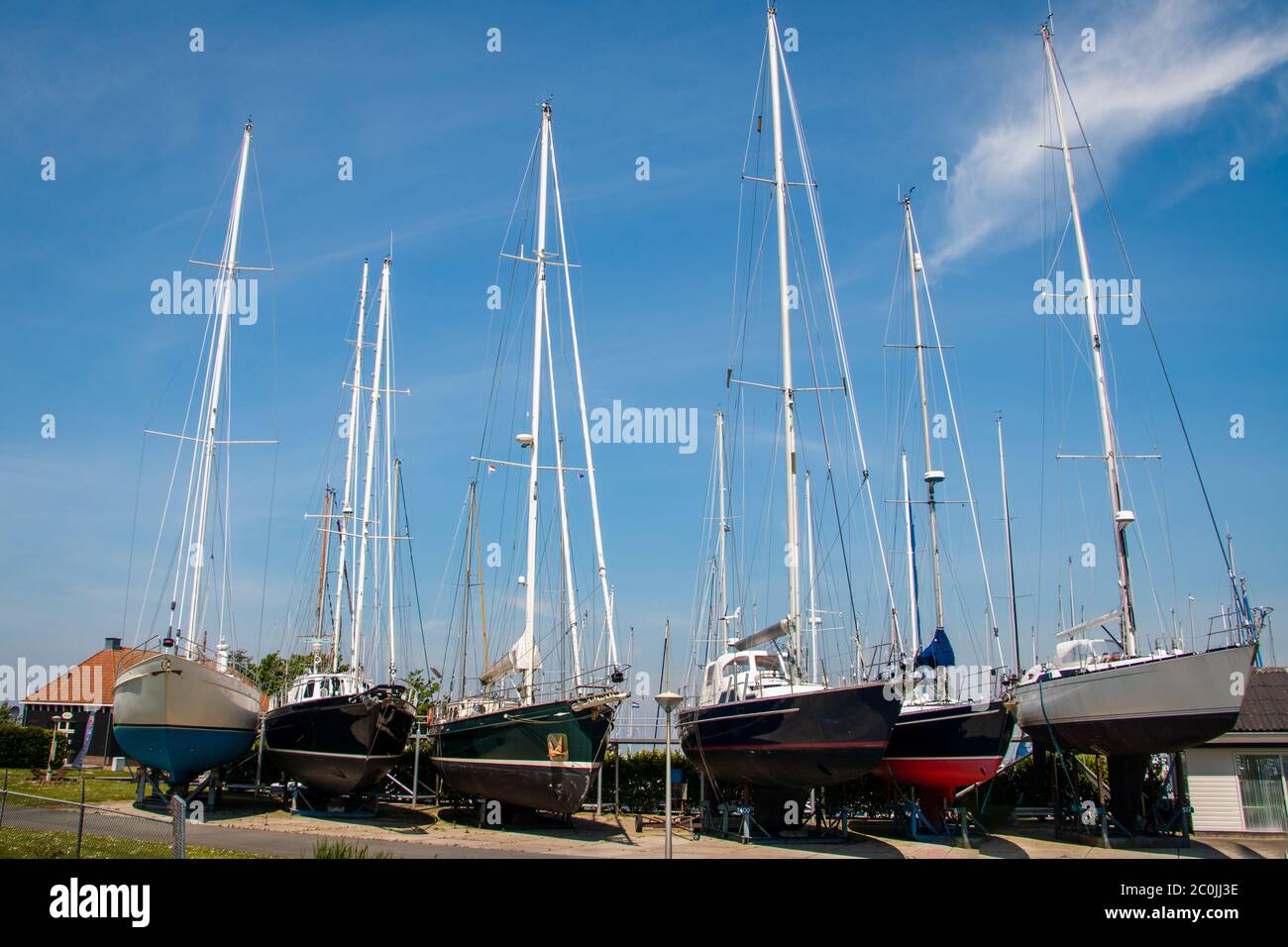 Shipyard with large sailing boats on dry land in the Netherlands in the  town of Hindeloopen, province of Friesland Stock Photo - Alamy