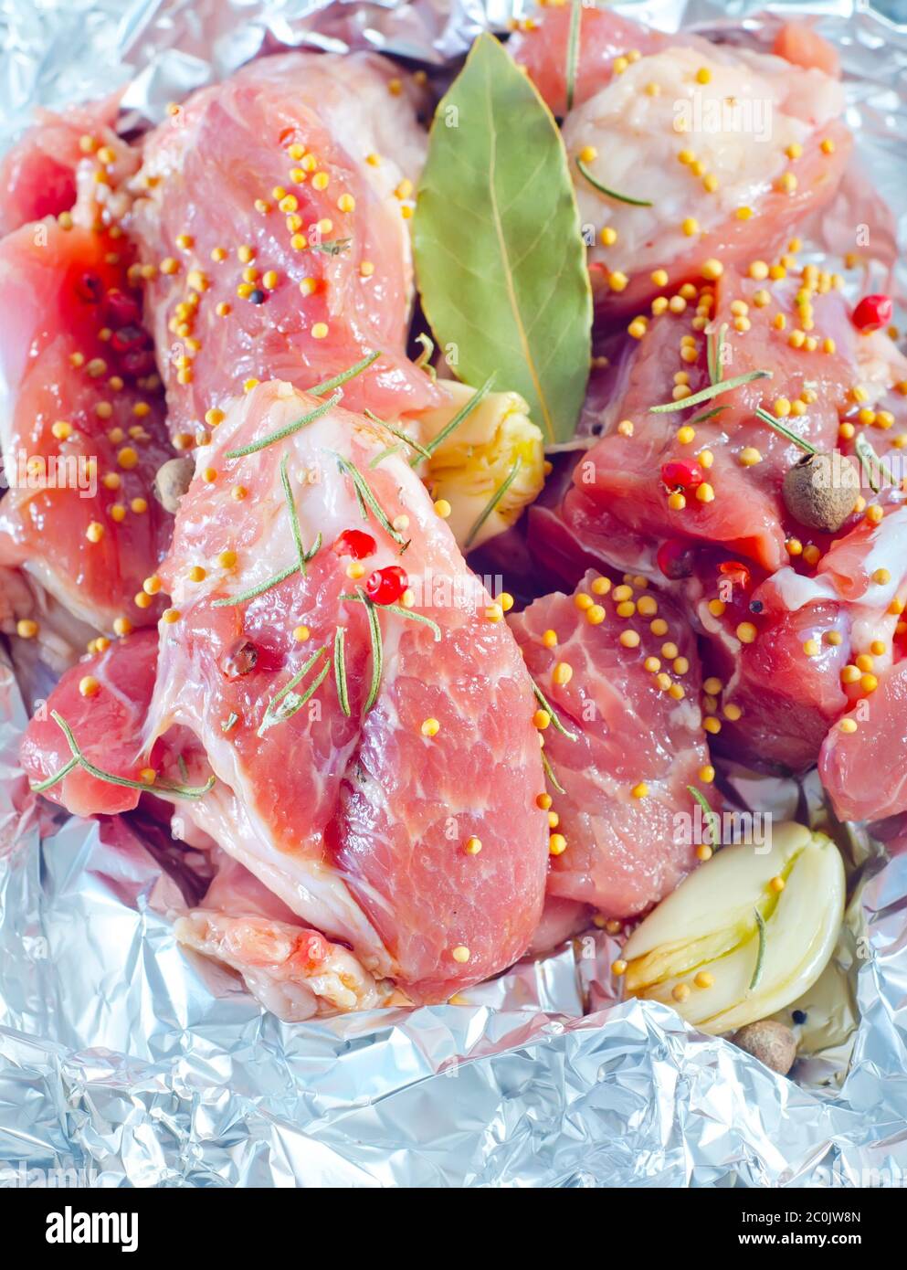 raw-meat-in-the-foil-stock-photo-alamy