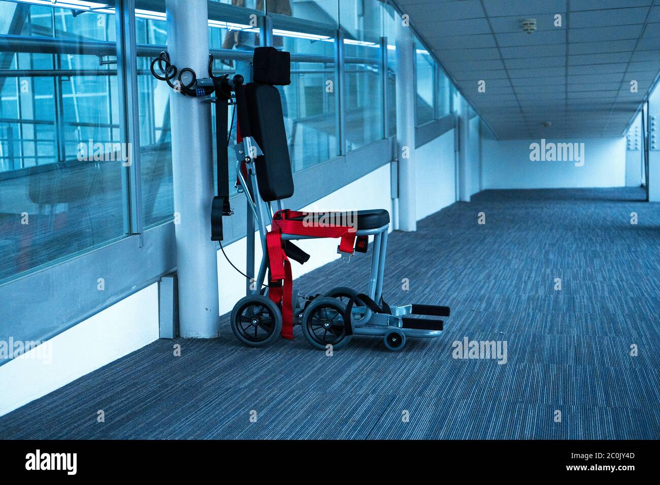 wheelchair, for moving around the airport close up Stock Photo Alamy