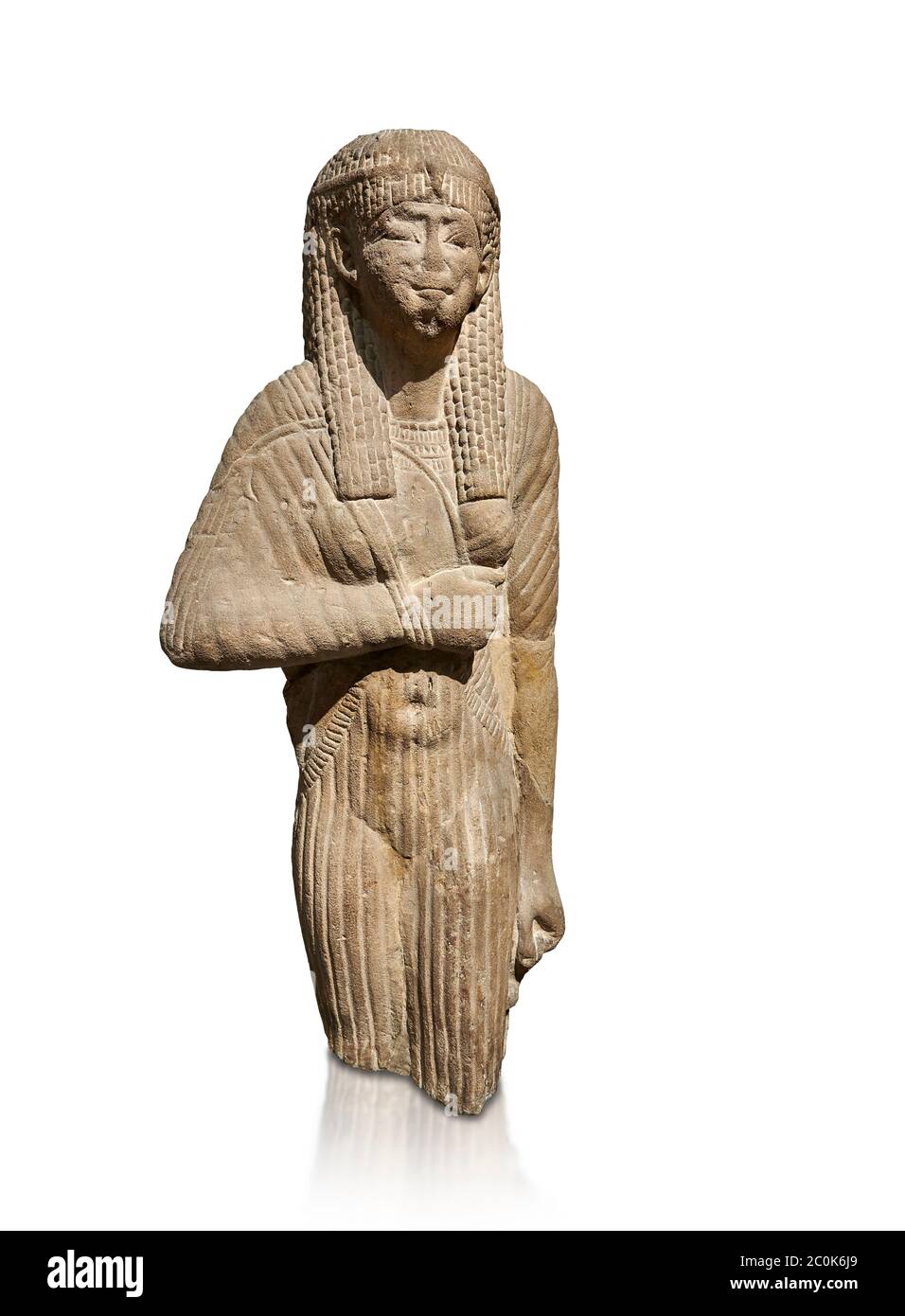 Ancient Egyptian statue of a queen wearing a clinging dress, sandstone, Ptolemaic Period (332-30BC). Egyptian Museum, Turin. Grey background  Drovetti Stock Photo