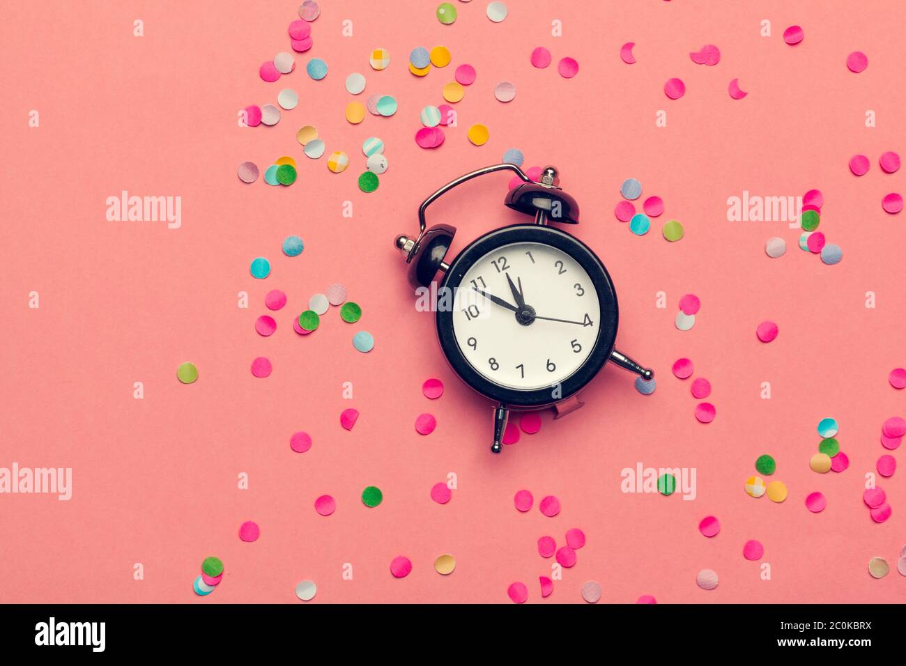 Clock and party decorations. close up. creative photo Stock Photo Alamy