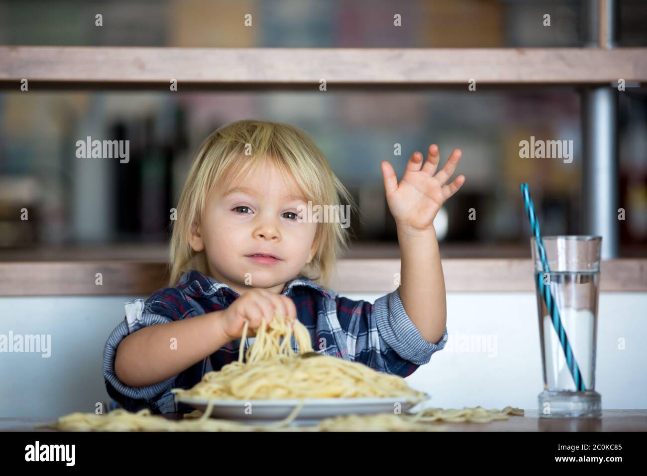feeding baby spaghetti