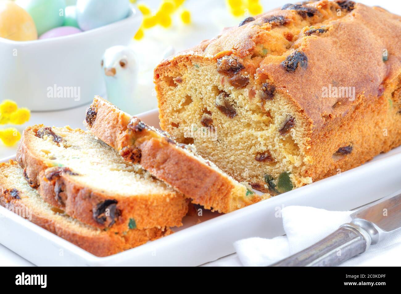 Delicious traditional fruitcake with raisins and candied fruit. Sliced