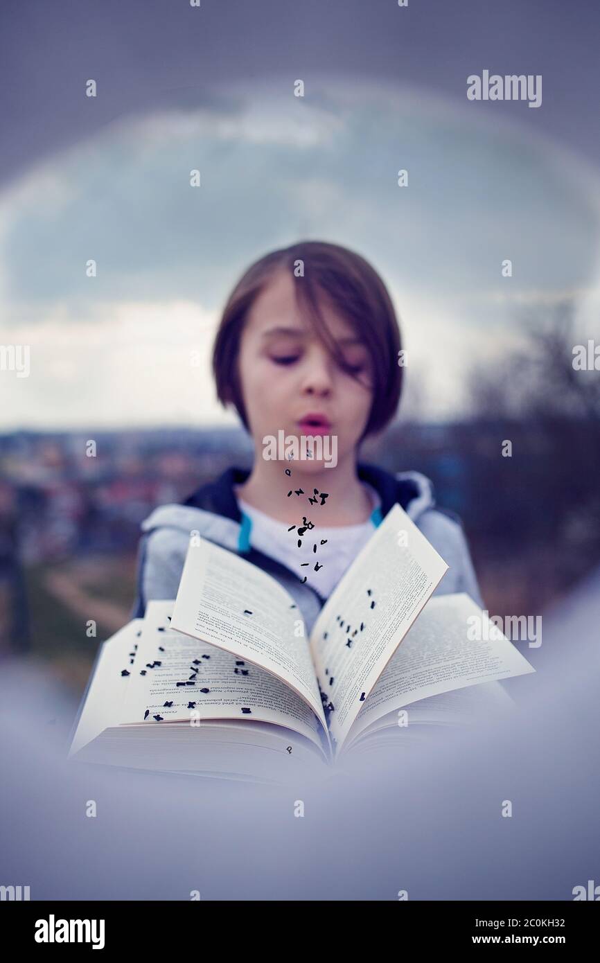 Beautiful child, boy, holding book, reading, playing, creative