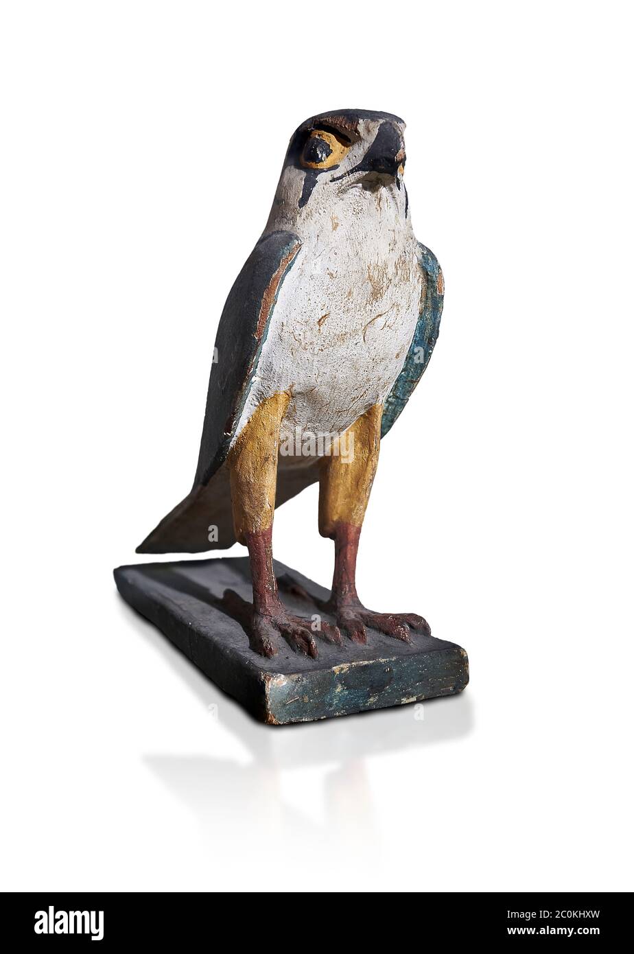 Ancient Egyptian wooden falcon bird, Late Period (722-322 BC). Egyptian Museum, Turin. white background.   Wooden tomb models were an Egyptian funerar Stock Photo