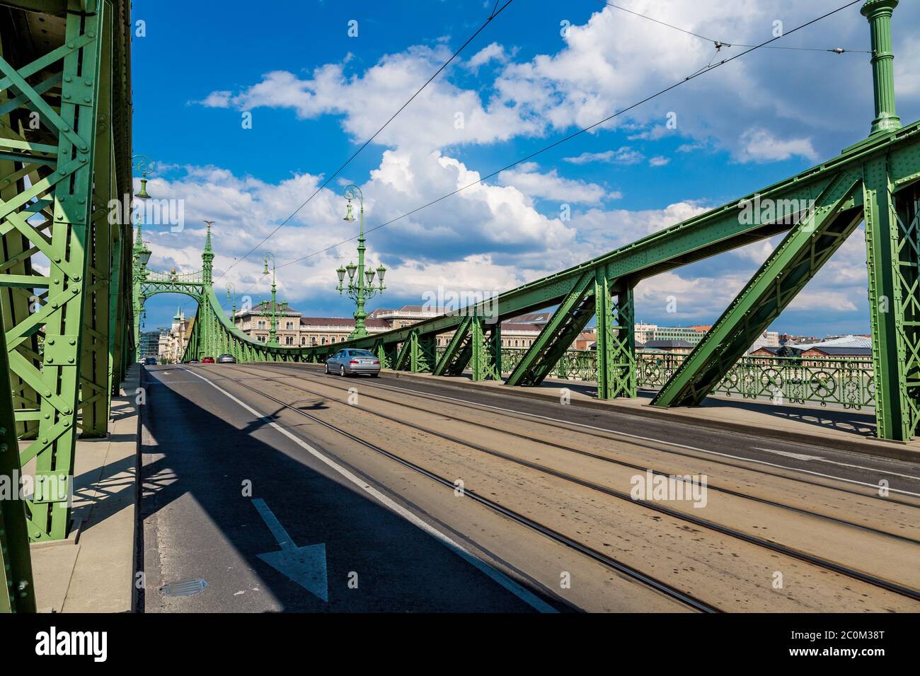 The green Freedom Bridge, with yellow tram, in Budapest,the capital of Hungary Stock Photo