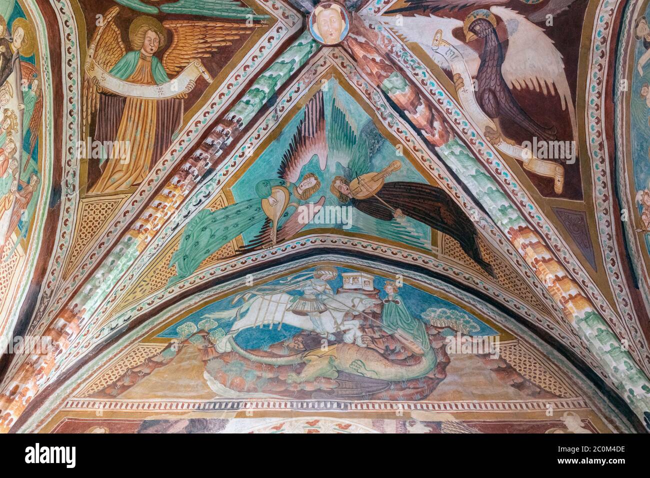 Frescos in the Romanesque-Gothic church of St. John the Baptist built circa 1100 on the shores of Lake Bohinj outside Ribcev Laz, Upper Carniola, Slov Stock Photo