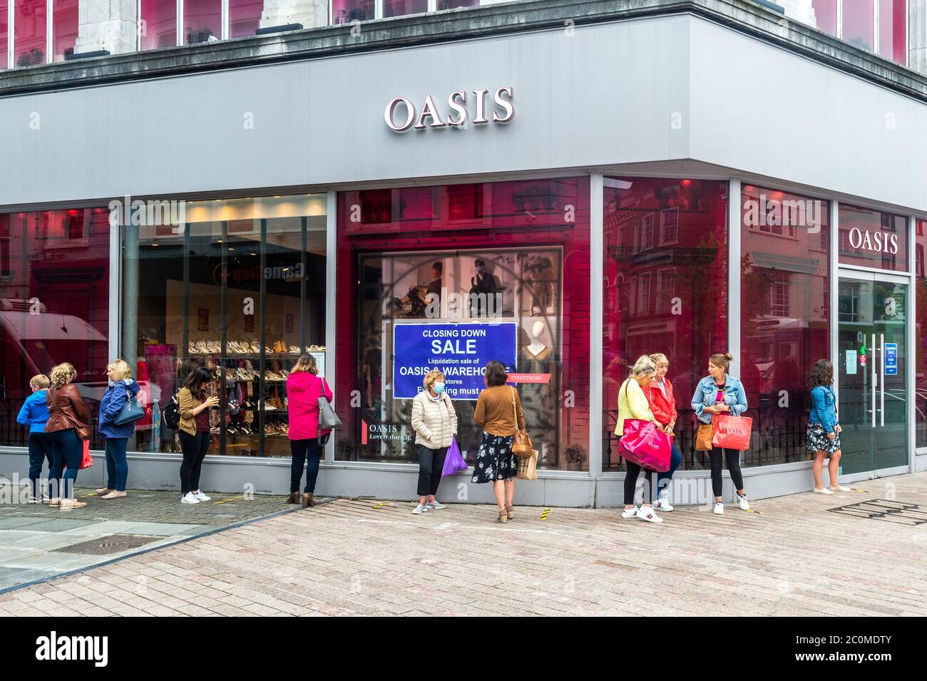 Cork, Ireland. 12th June, 2020. Oasis in Ireland has gone into liquidation. There was a big queue to take advantage of the liquidation sale in the Cork City store this morning. Credit: AG News/Alamy Live News Stock Photo