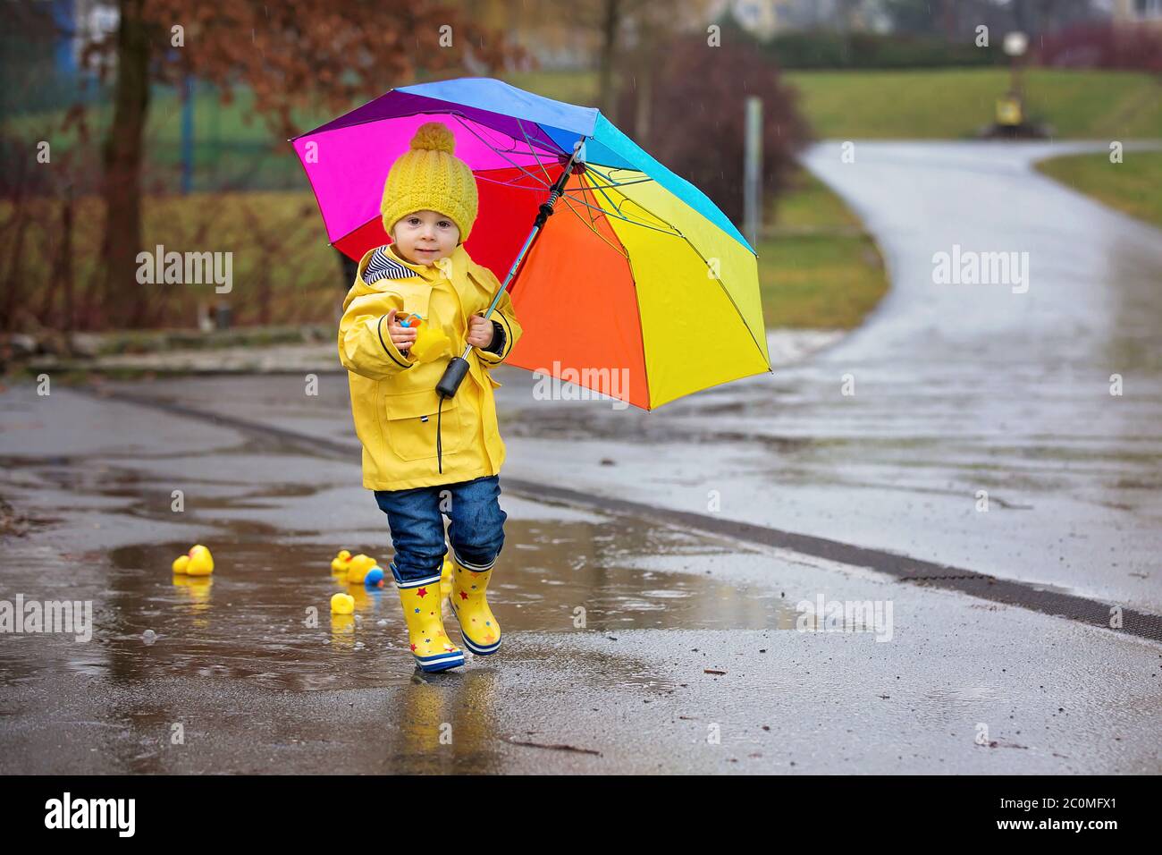 Beautiful funny blonde toddler boy with 