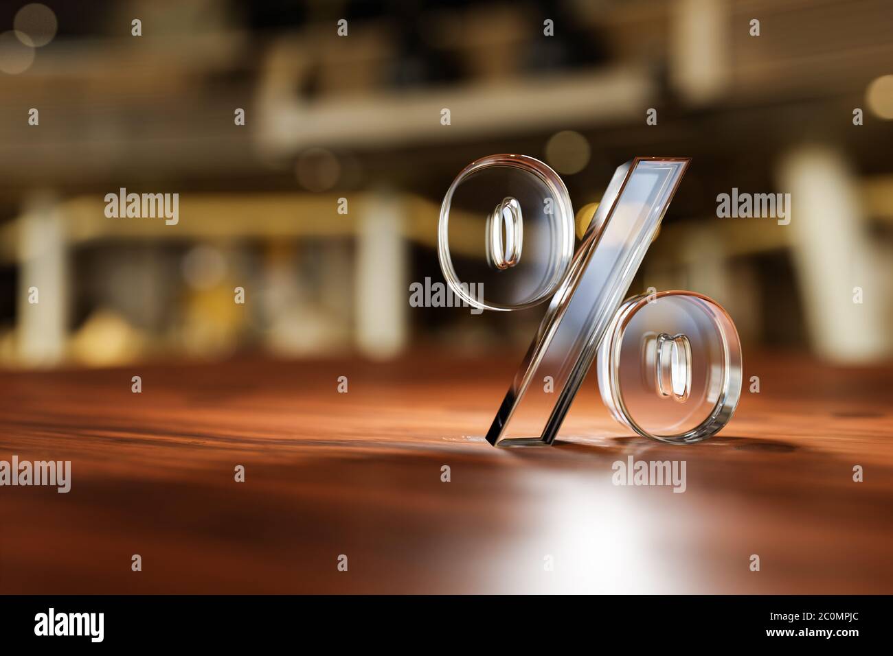 Percent sign made from glass material on wooden table in department store Stock Photo