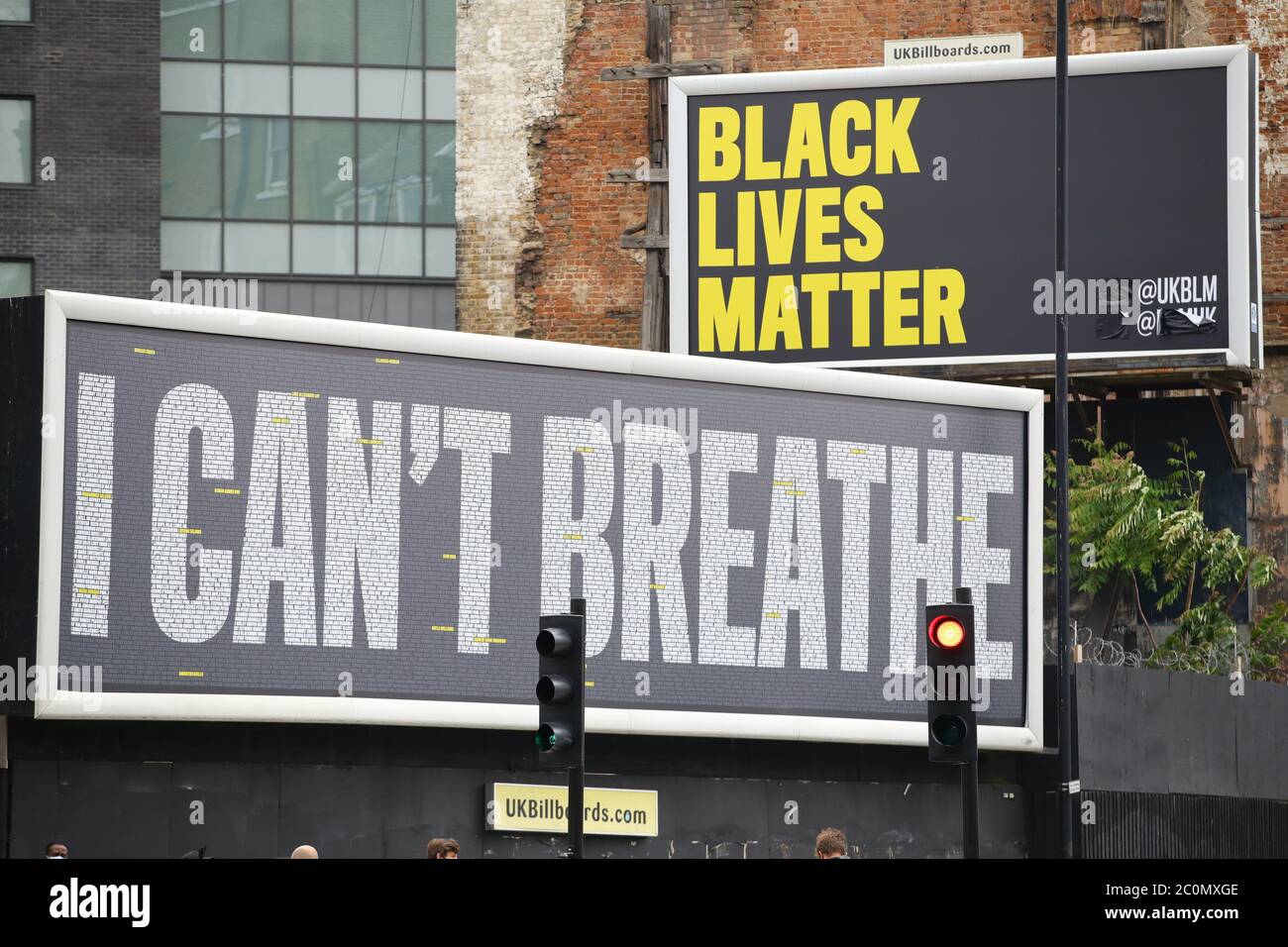 The Black Lives Matter UK (BLMUK) billboard on Westminster Bridge Road, London, which lists more than 3000 names of people who have died in police custody, prisons, immigration detention centres and in racist attacks in the UK, as well as those who have died as the result of coronavirus. The billboard has been erected by BLMUK, in collaboration with the United Families and Friends Campaign, Justice for Belly, Justice for Shukri, Migrants Organise and the Grenfell Estate. Stock Photo