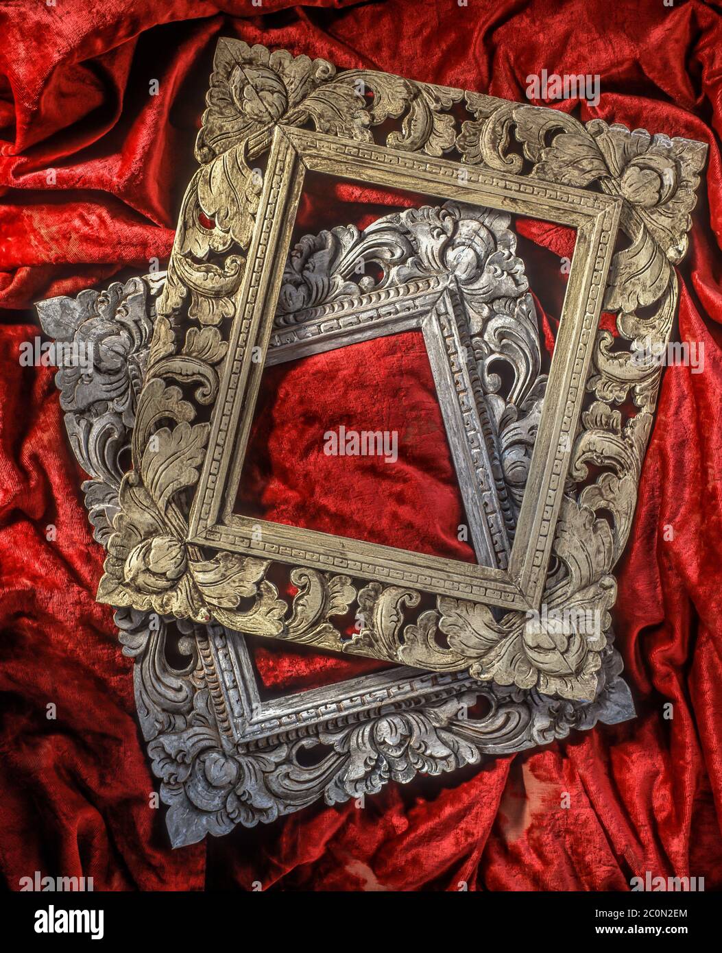 Ornate picture frames on red velvet Stock Photo Alamy