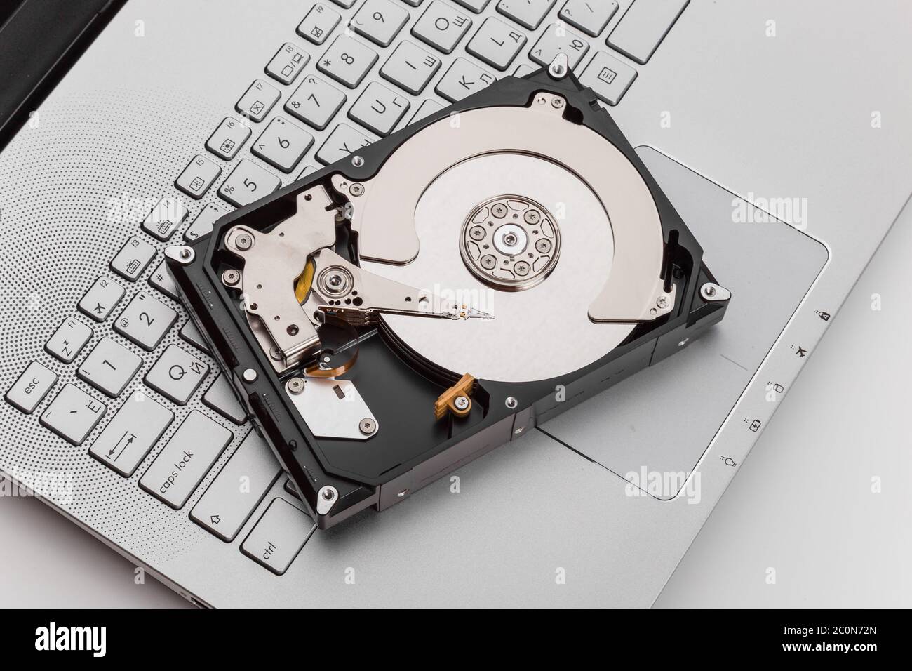 HDD over notebook keyboard Stock Photo
