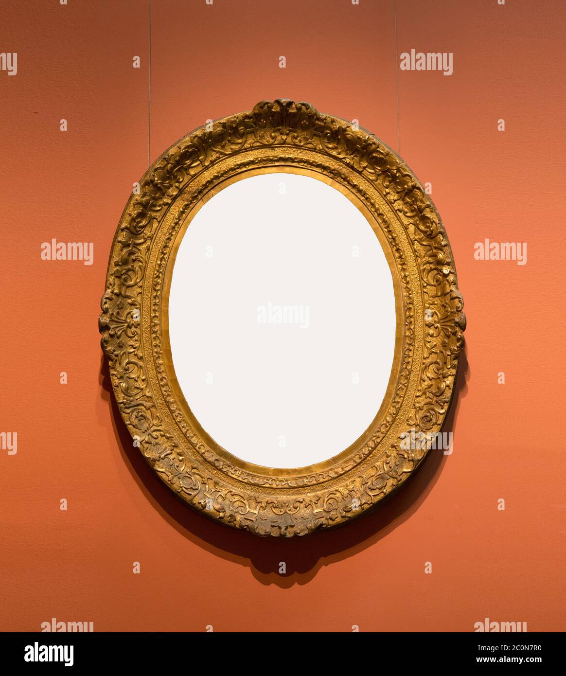 Oldfashioned oval frame on wall Stock Photo Alamy