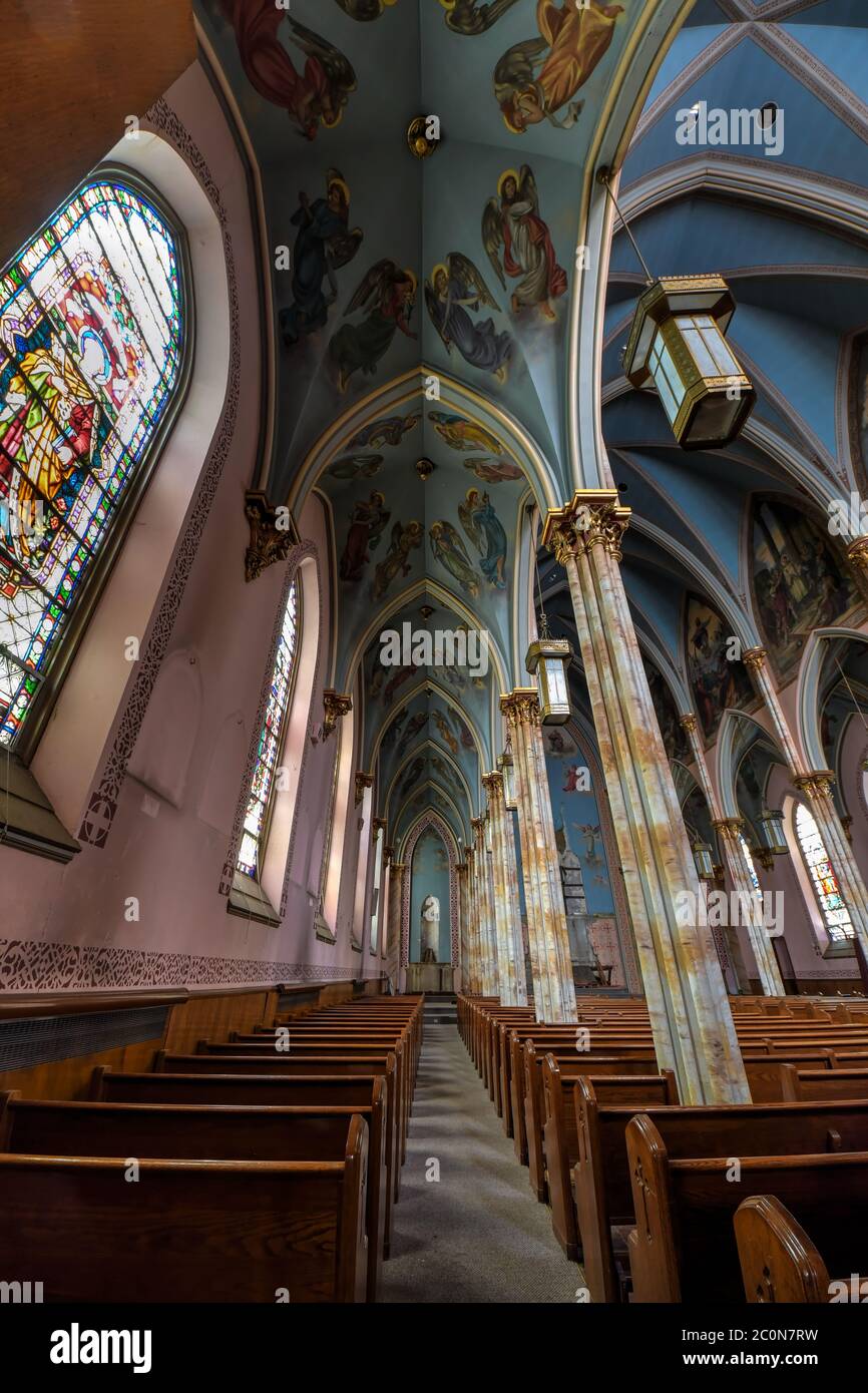 Beautiful pink and blue church interior with murals and altar Stock ...