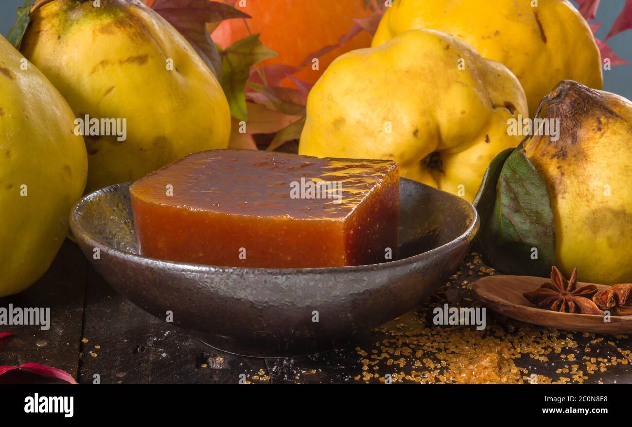 Homemade quince candy and raw fruits Stock Photo Alamy