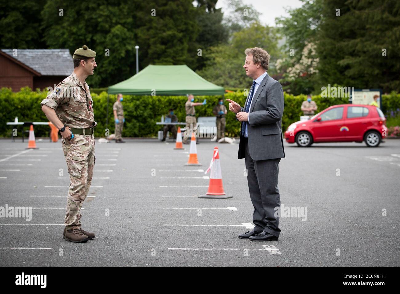 Scottish Secretary Alister Jack (right), with Brigadier Robin Lindsay, Commander of the Joint Military Command for the COVID Response, during a visit to a mobile coronavirus testing unit being run by the army in Moffat, Scottish Borders. Stock Photo