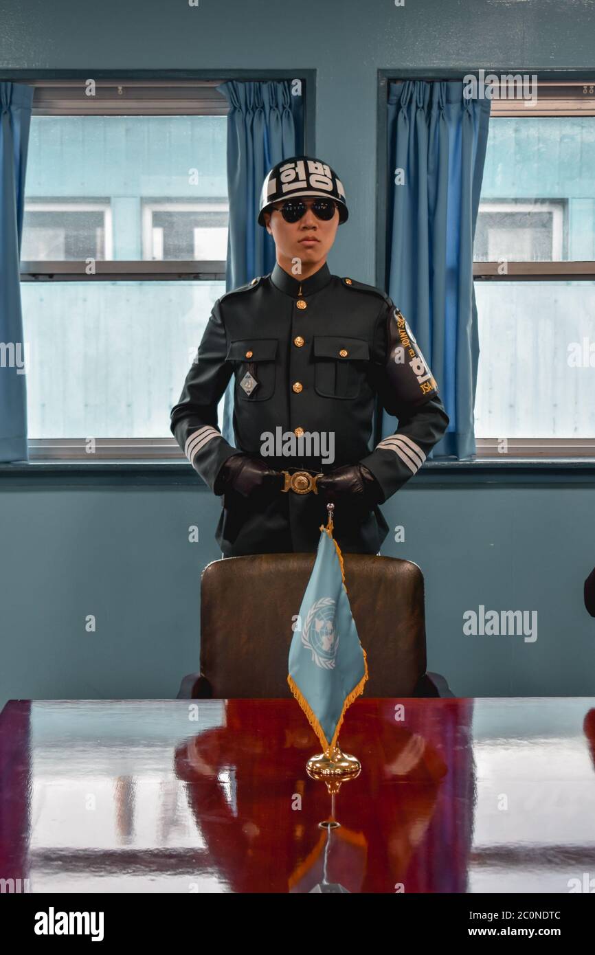 Elite Korean guard in the panmunjom blue house in Joint Security Area Stock Photo