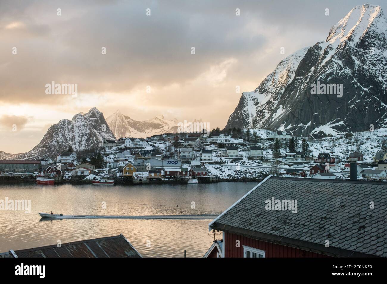 A winter sunset over reinefjord in Lofoten. Stock Photo