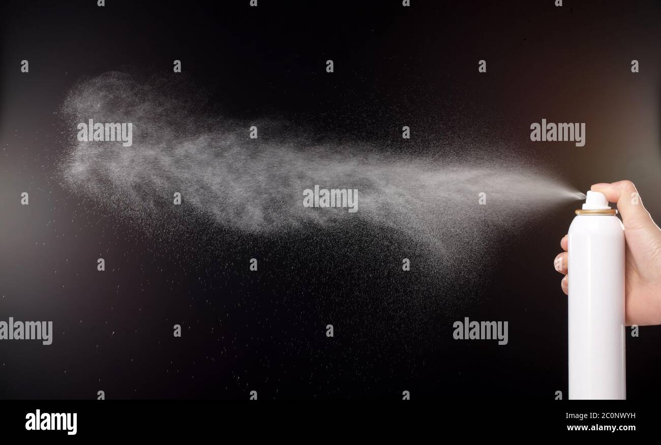 a spray of liquid in a black background Stock Photo Alamy