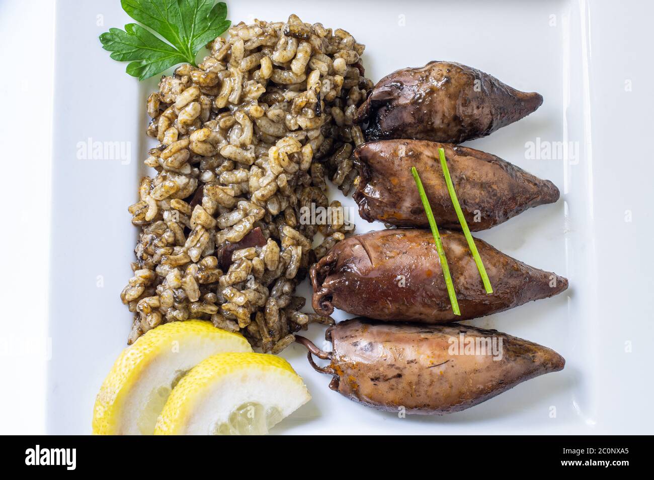 homemade rice with squid on ink sauce Stock Photo - Alamy