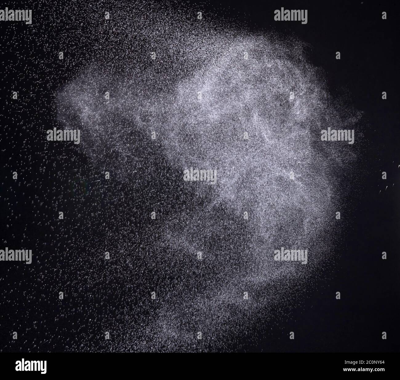 a spray of liquid in a black background Stock Photo Alamy