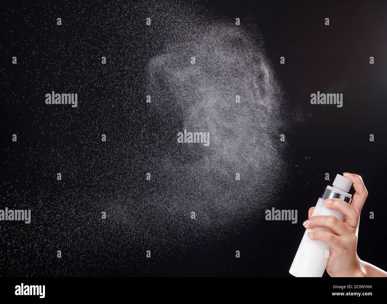 a spray of liquid in a black background Stock Photo Alamy