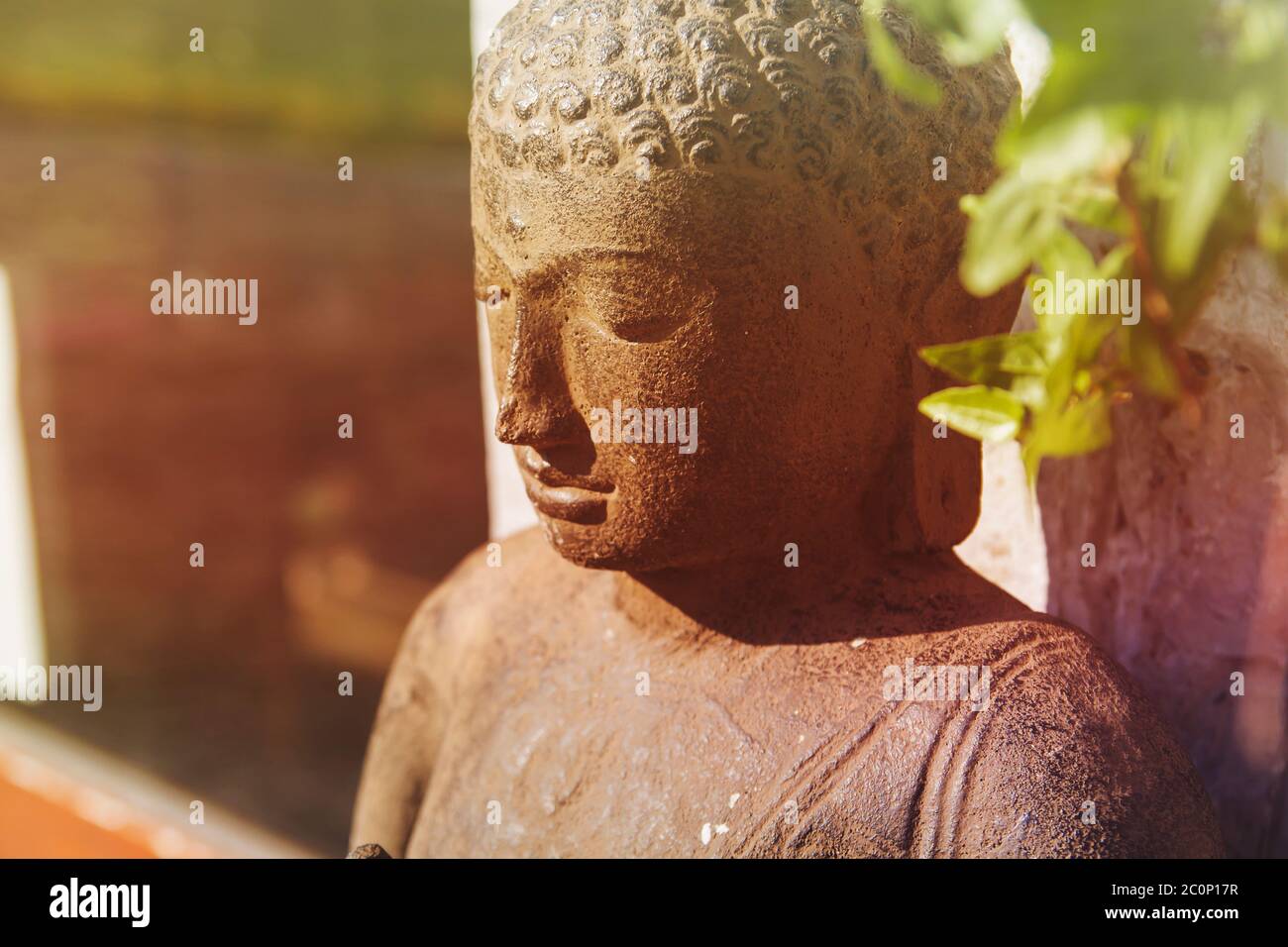 Buddha decorative statue in a garden Stock Photo Alamy