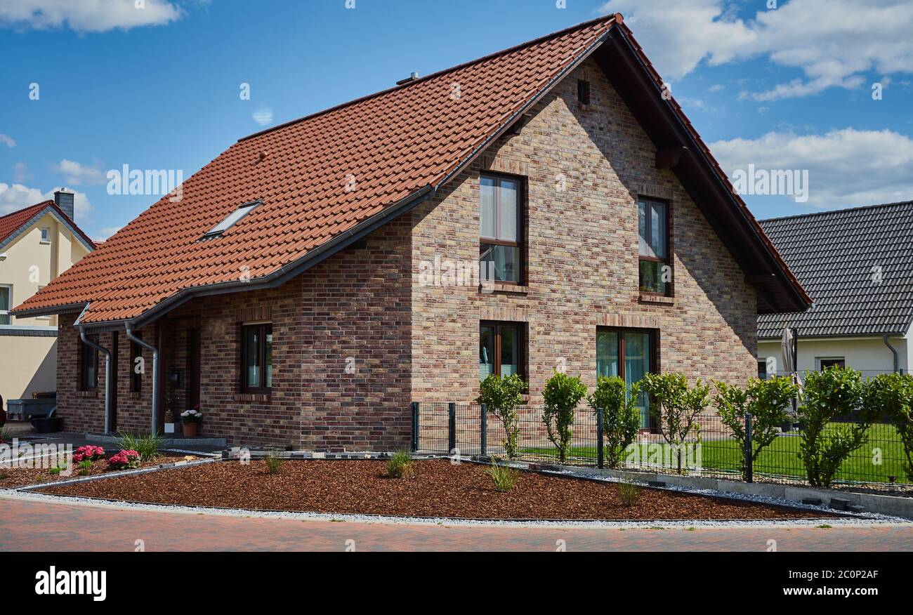 Gifhorn, Germany, May 14., 2020: Newly built detached house in a development area of Germany Stock Photo