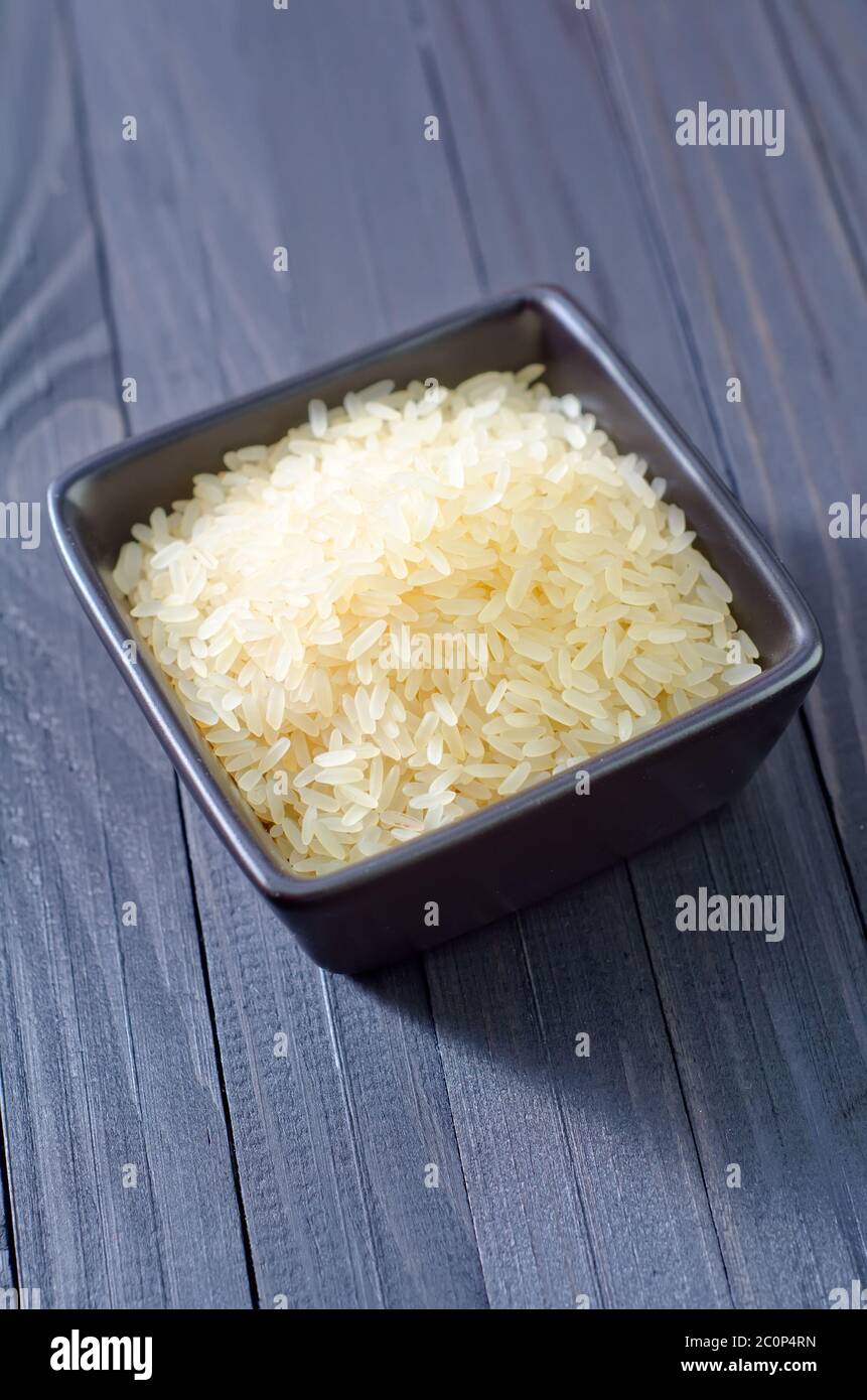 White uncooked rice inside hi-res stock photography and images - Alamy