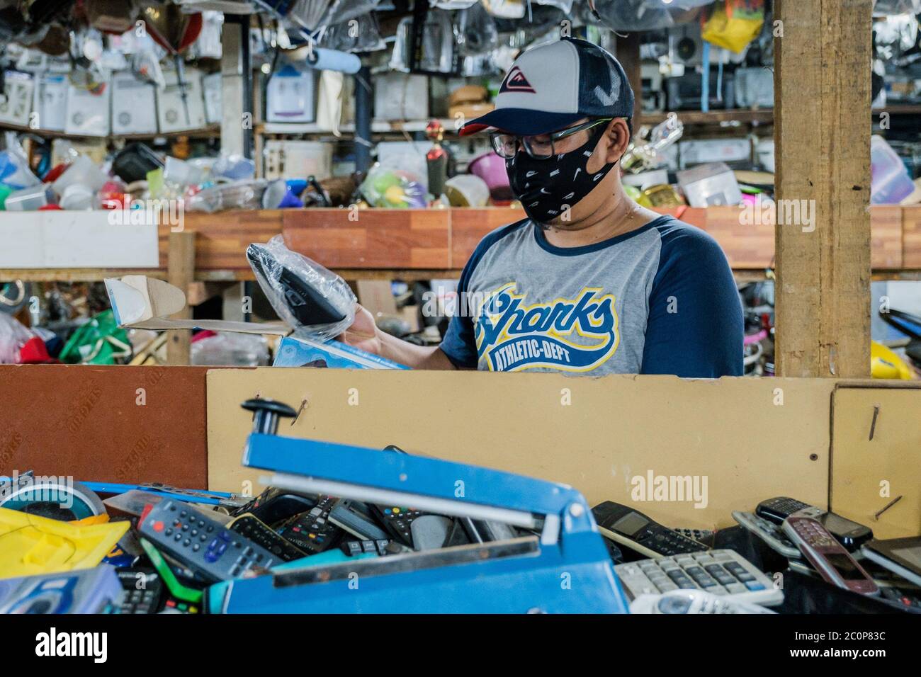 Depok, Indonesia. 11th June, 2020. A consumer wears a face mask as a preventative measure, at a flea market in Depok, West Java, Indonesia, June 11, 2020. (Photo by Evan Praditya/INA Photo Agency/Sipa USA) Credit: Sipa USA/Alamy Live News Stock Photo