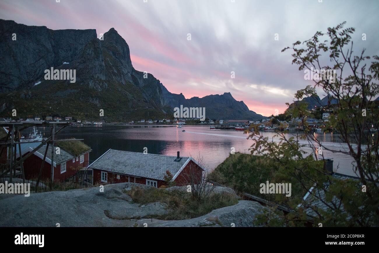 A stunning pink sunset over Reine in Lofoten. Stock Photo