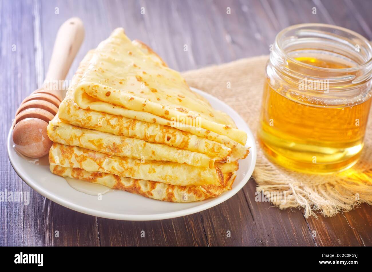 pancakes with honey Stock Photo Alamy