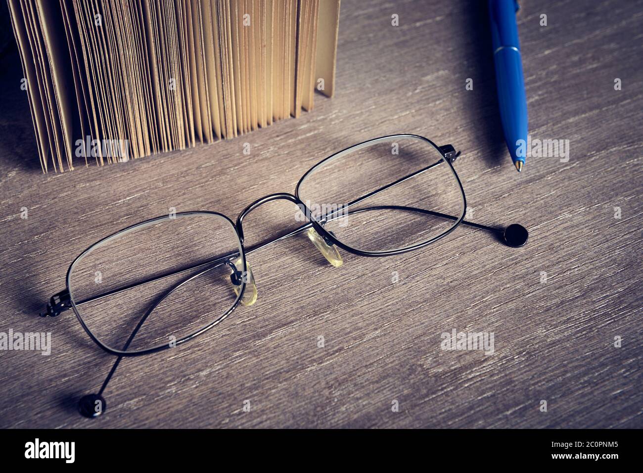 Book lying on the table hi-res stock photography and images - Alamy