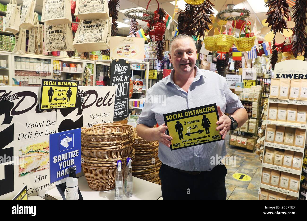 Kieran Sloan, managing director of famous deli Sawers in Belfast, after all shopping centres and retailers were given the green light to reopen in a significant relaxation of coronavirus lockdown restrictions in Northern Ireland. Stock Photo