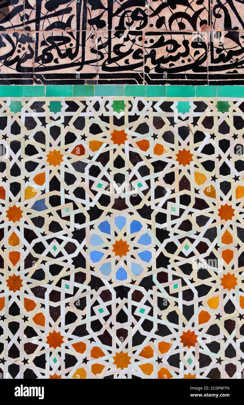 Fez, Morocco. Detail of fountain colorful, glazed ceramic wall tiles