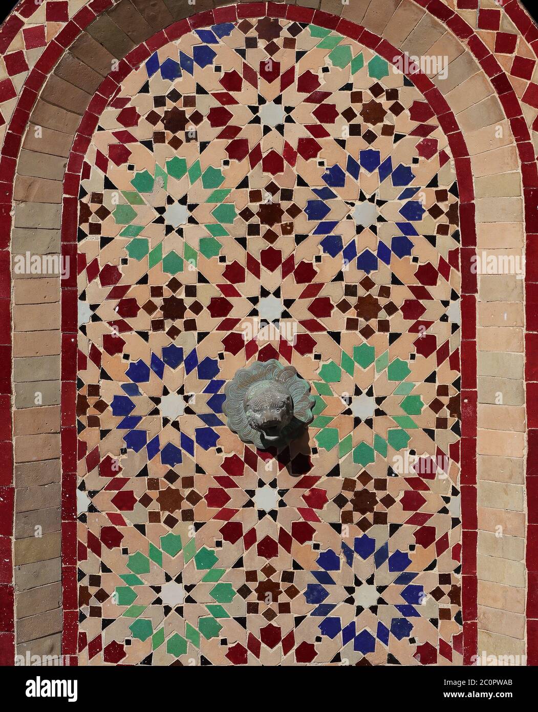 Fez, Morocco. Detail of fountain colorful, glazed ceramic wall tiles