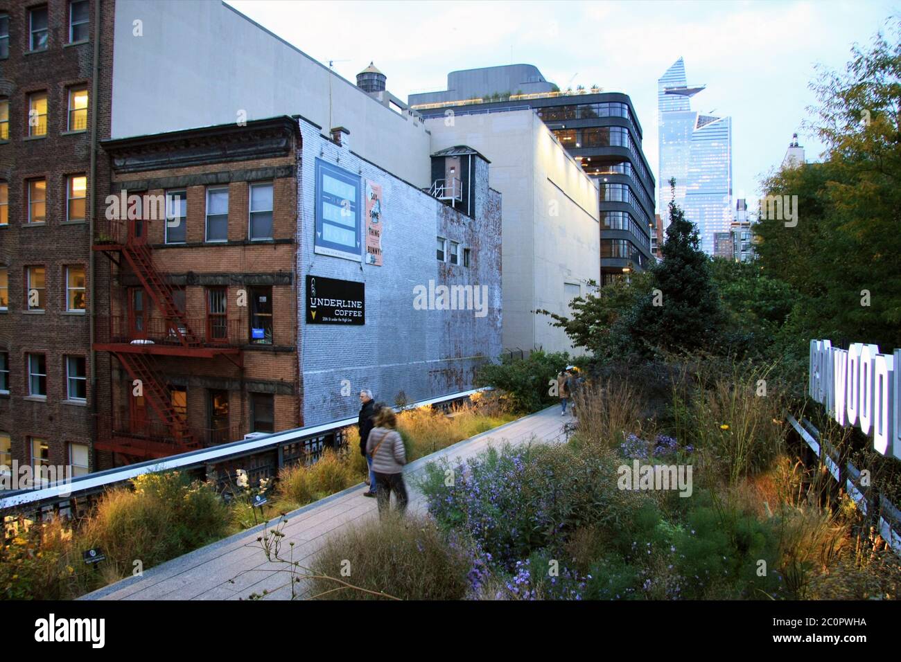 NYC New York City - the High Line on a dusky evening with walkers and ...
