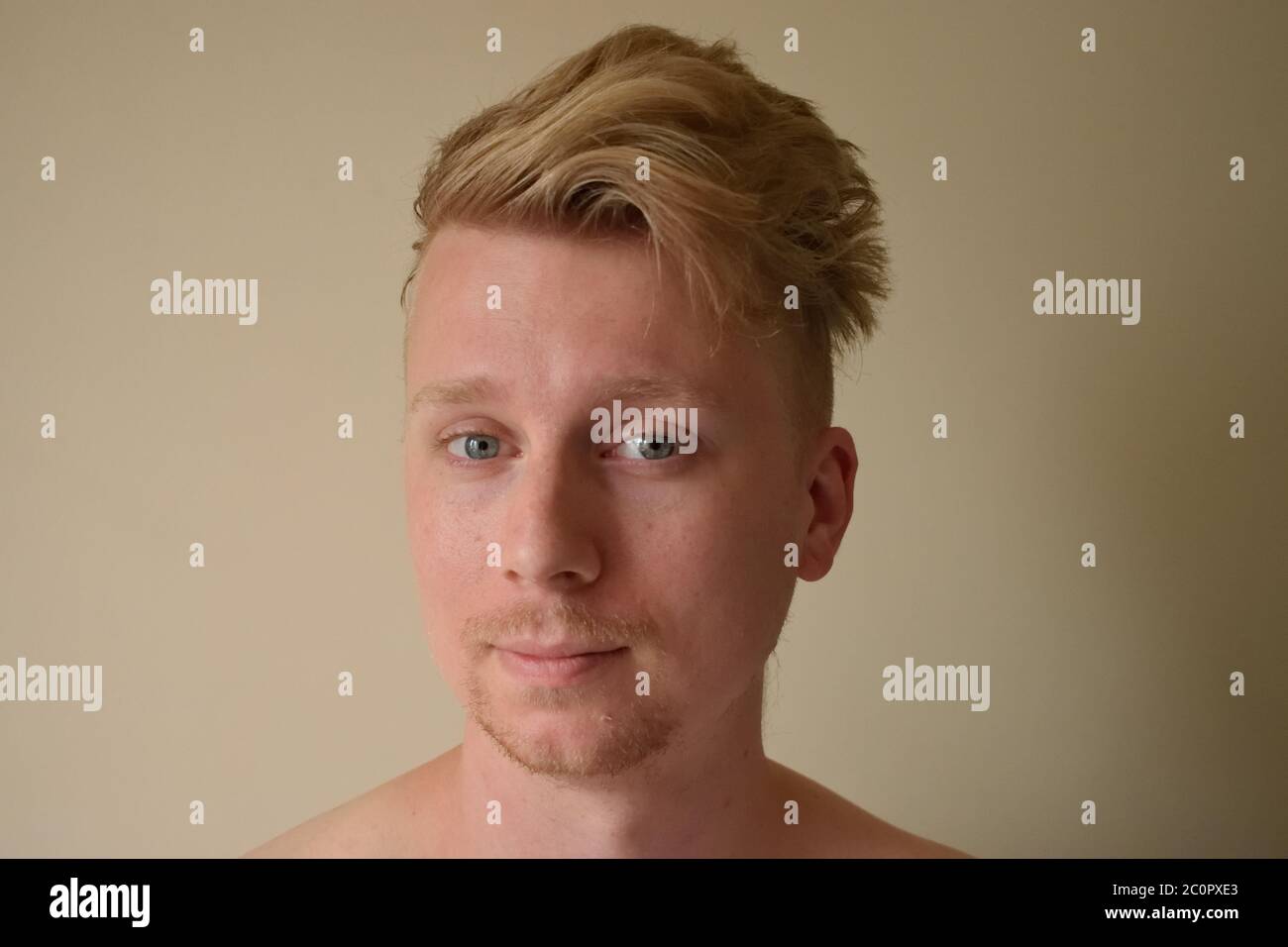 Blond hair blue eyed young man hi-res stock photography and images - Alamy