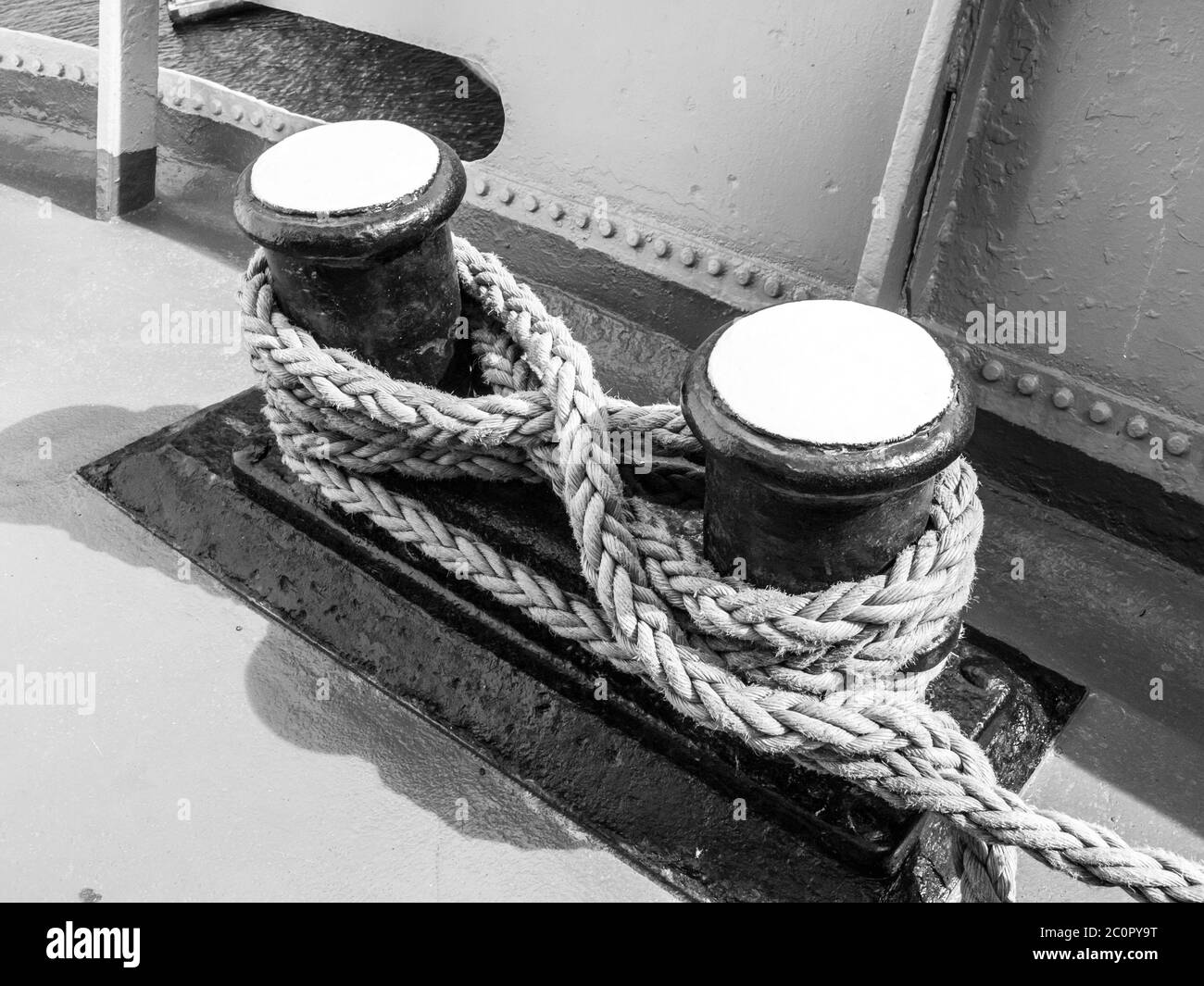 Old mooring bollard on the ship, in black and white Stock Photo