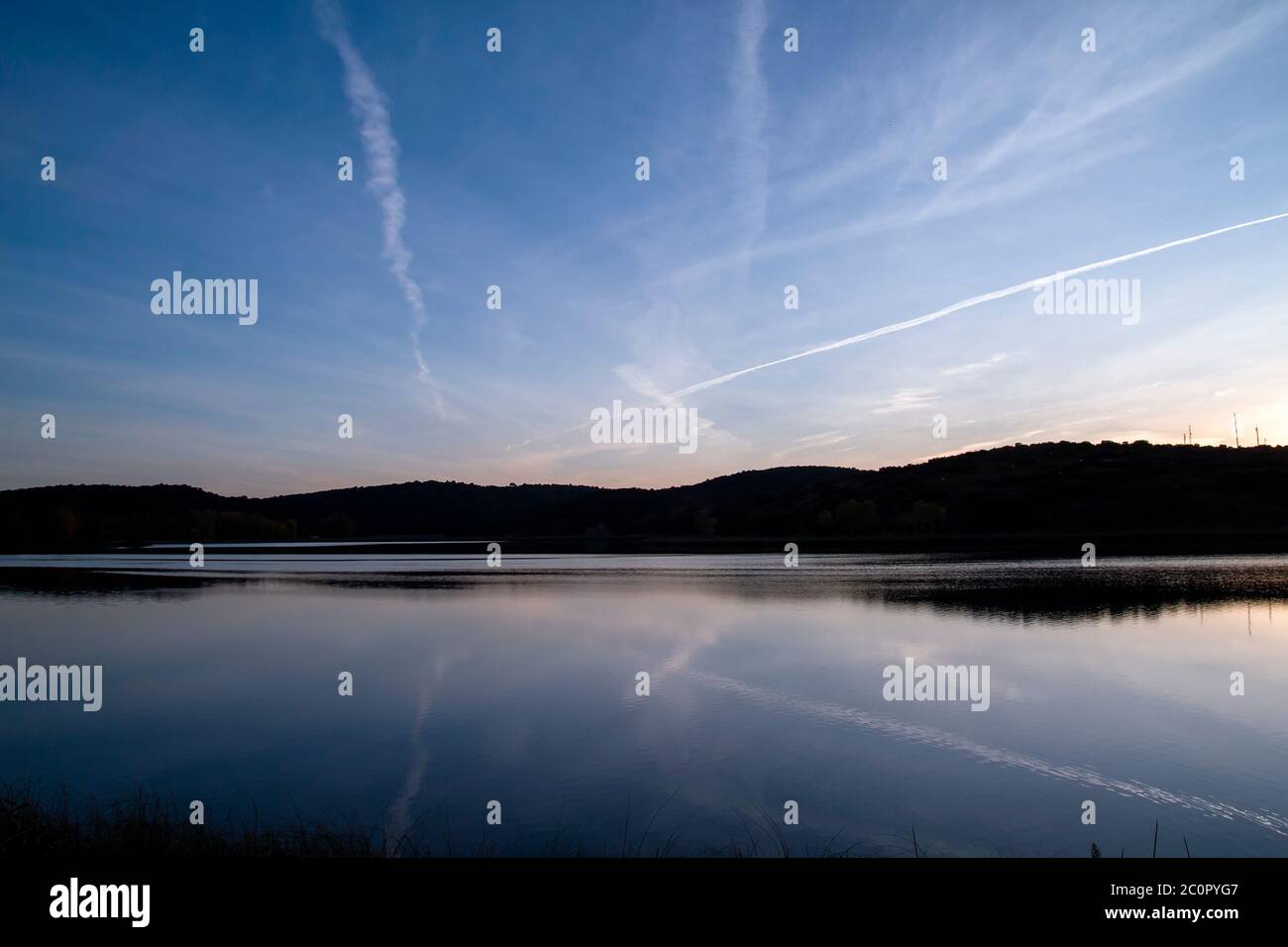 Landscape in a lake at sunset Stock Photo - Alamy