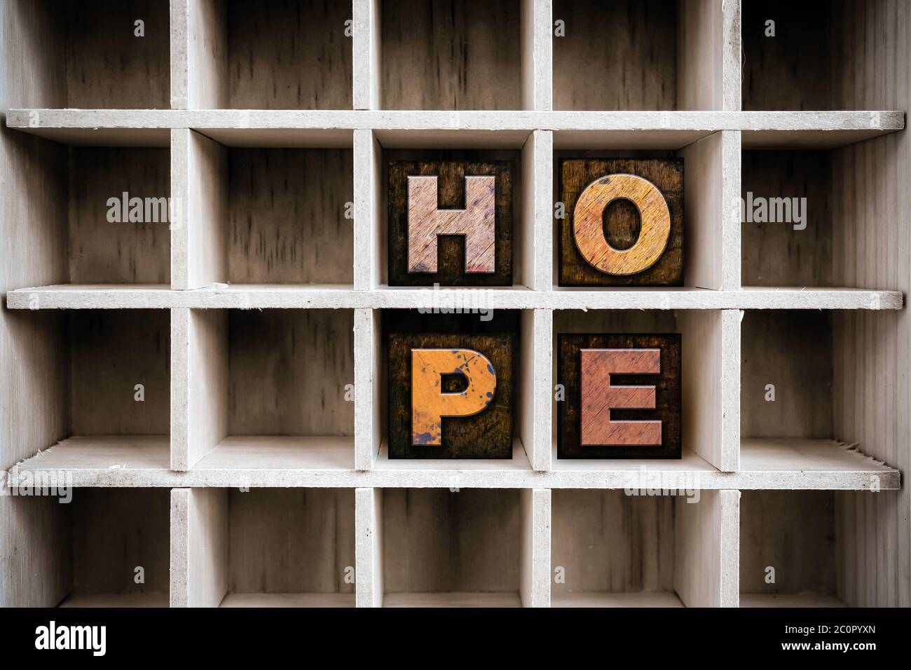 Hope Concept Wooden Letterpress Type in Draw Stock Photo