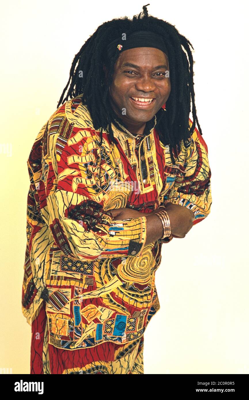 08.02.1998, the Cameroonian pop singer Wes Madiko from the world music duo Wes at the RSH Gold Dance Chart Party in the Ostseehalle in Kiel. They had their biggest hit in 1997 and 1998 with the cult song 'Alane'. Portrait of the cheerful singer in front of a neutral background. | usage worldwide Stock Photo