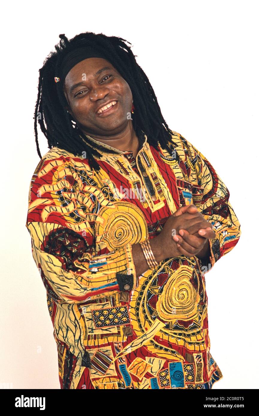 08.02.1998, the Cameroonian pop singer Wes Madiko from the world music duo Wes at the RSH Gold Dance Chart Party in the Ostseehalle in Kiel. They had their biggest hit in 1997 and 1998 with the cult song 'Alane'. Portrait of the cheerful singer in front of a neutral background. | usage worldwide Stock Photo