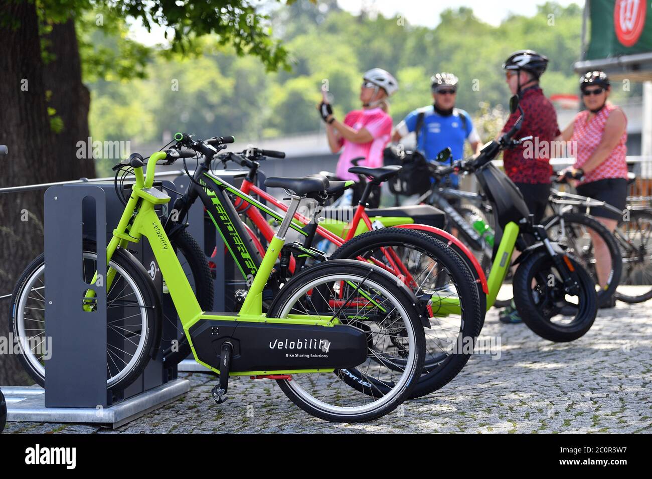 12 June 2020, Thuringia, Saalburg-Ebersdorf: An e-bike charging station has been put into operation at the passenger ship Saalburg. Further stations are to follow in order to boost cycle tourism in the reservoir region known as the 'Thuringian Sea' at the Bleiloch dam and the Hohenwarte reservoir. Photo: Martin Schutt/dpa-Zentralbild/dpa Stock Photo